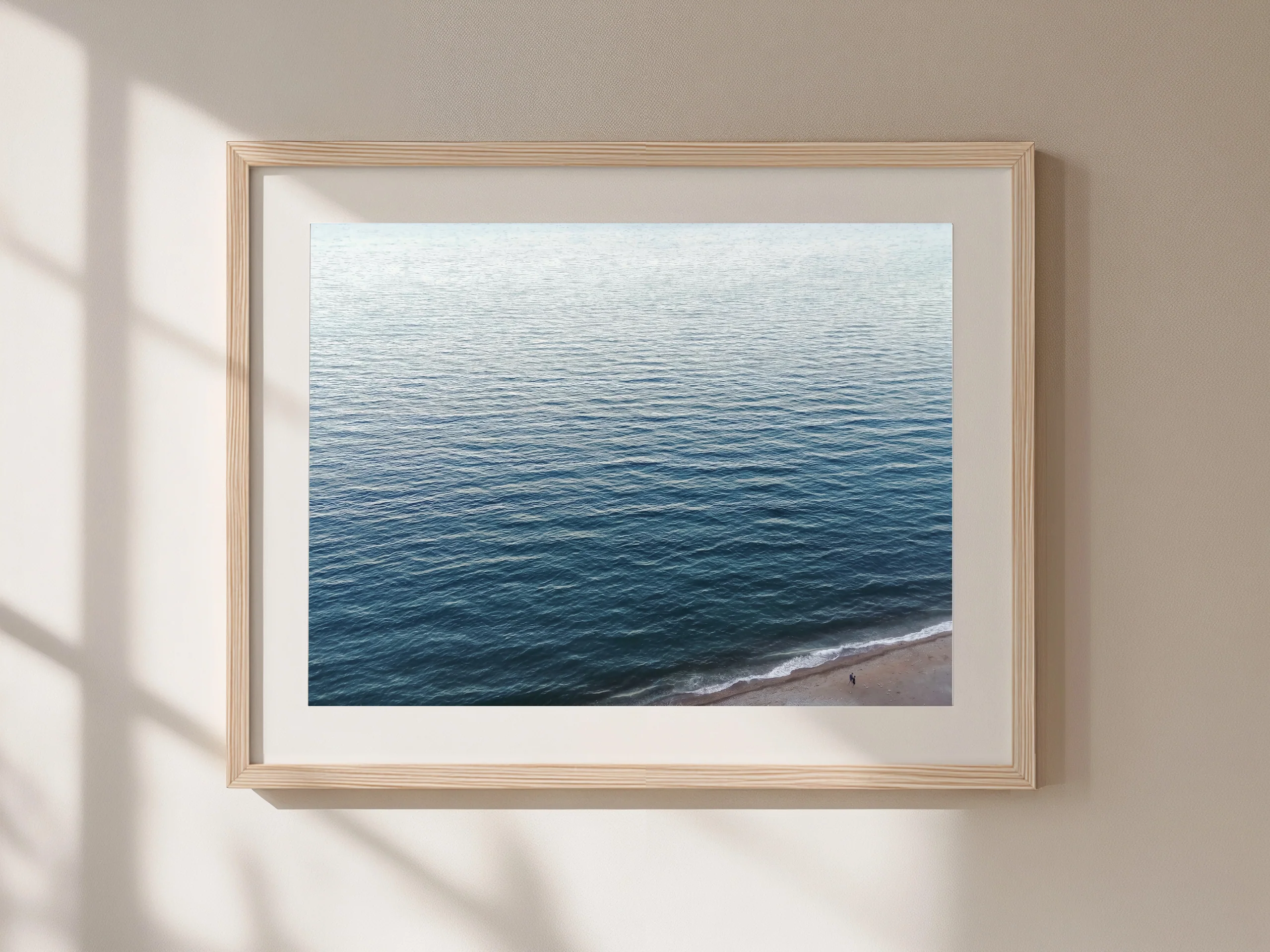Open Water framed art print in a calm, sunlit interior